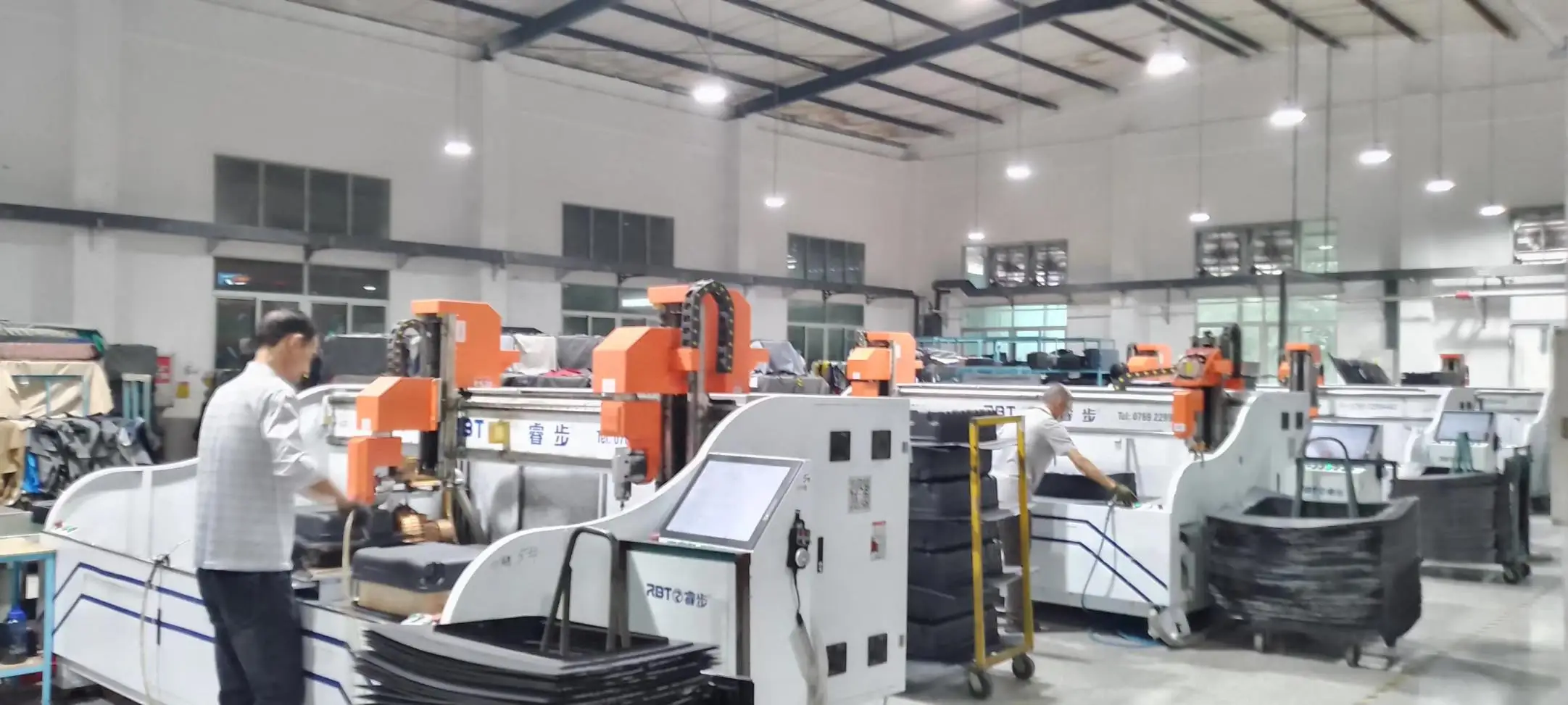 Ten-axis CNC tooling machining hardside PC shells on the line